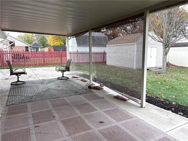 view of patio with a storage unit