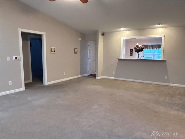 unfurnished living room featuring carpet