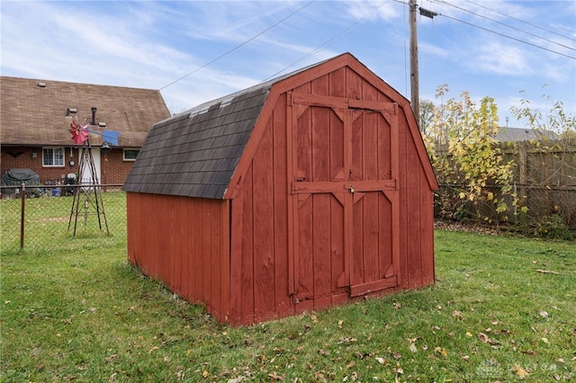 view of outdoor structure with a yard