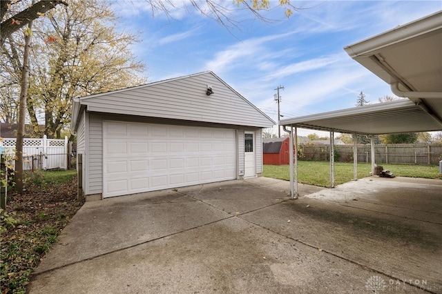 garage featuring a yard