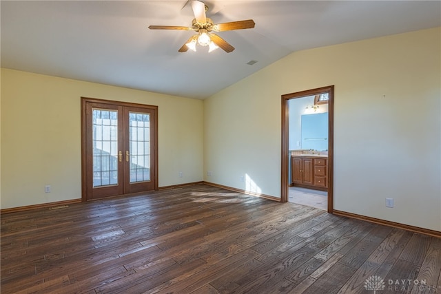 empty room with french doors, dark wood-type flooring, ceiling fan, and lofted ceiling