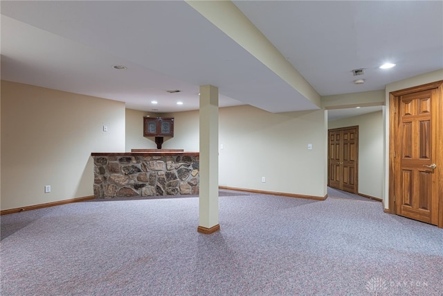 basement featuring carpet