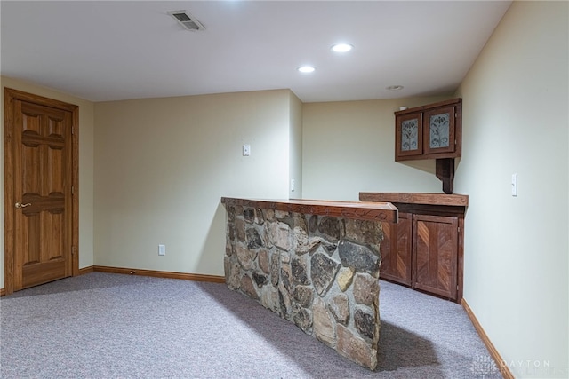 bar with light colored carpet