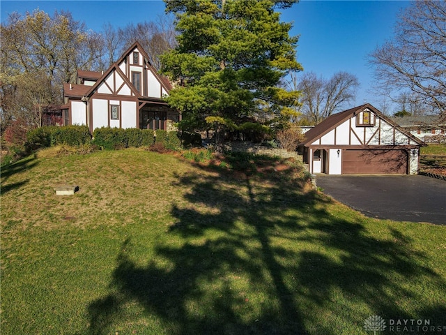 view of yard featuring a garage