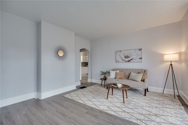 unfurnished living room with hardwood / wood-style floors