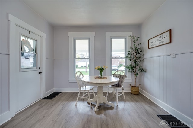 dining area with light wood-type flooring