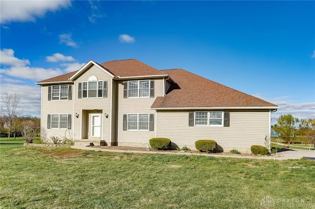 view of front facade with a front yard