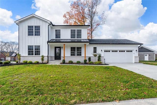 modern inspired farmhouse featuring covered porch, a garage, and a front yard