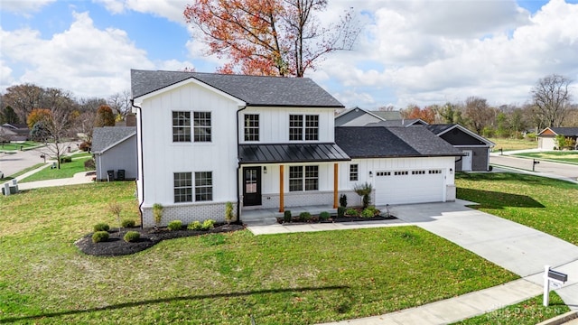 view of front of home featuring a front lawn, a porch, and a garage