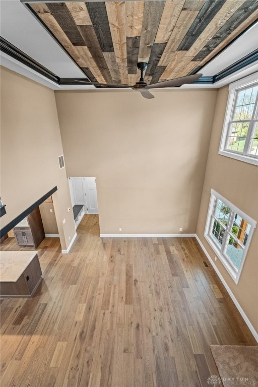 spare room with ceiling fan and light hardwood / wood-style flooring