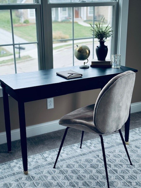 view of carpeted dining space