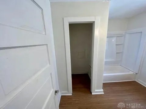 bathroom featuring hardwood / wood-style flooring