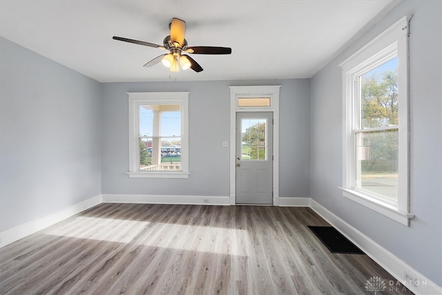 entrance foyer featuring ceiling fan and light hardwood / wood-style flooring