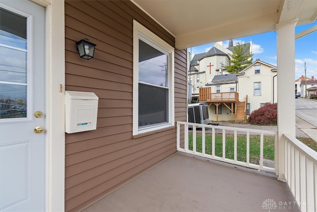 balcony featuring a porch