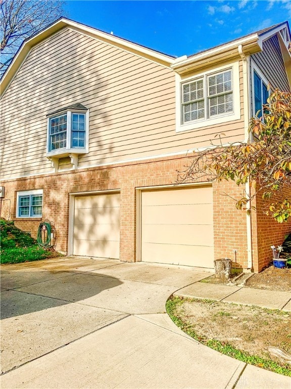 view of home's exterior featuring a garage