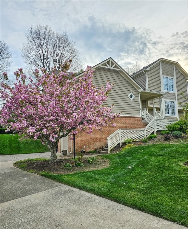 view of property exterior featuring a yard