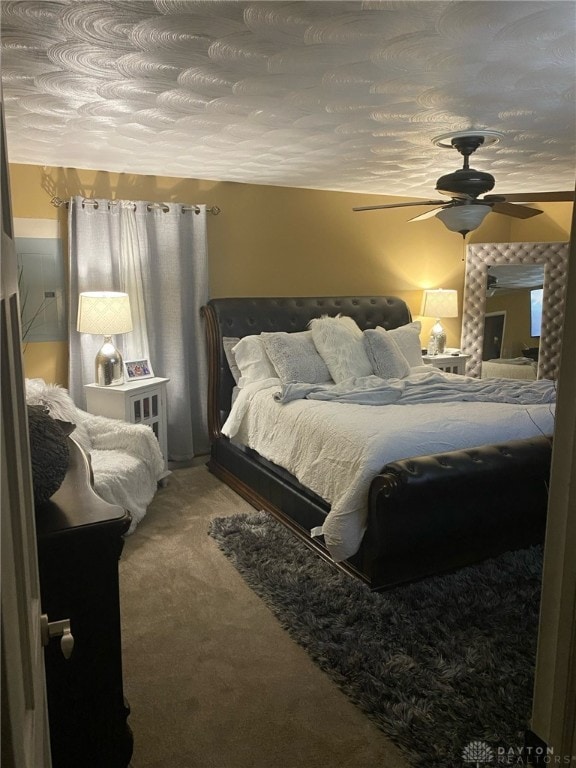 bedroom featuring carpet flooring and ceiling fan