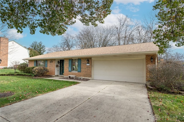 single story home with a front yard and a garage