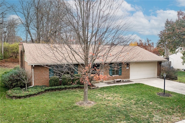 ranch-style home with a front yard and a garage