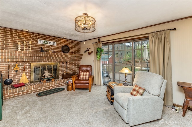 living room featuring crown molding, a fireplace, a notable chandelier, carpet floors, and brick wall