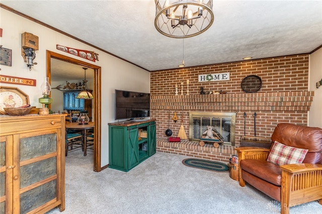 living room with light carpet, a fireplace, ornamental molding, a textured ceiling, and a chandelier