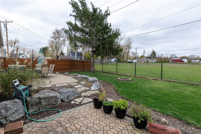 view of yard with a patio area