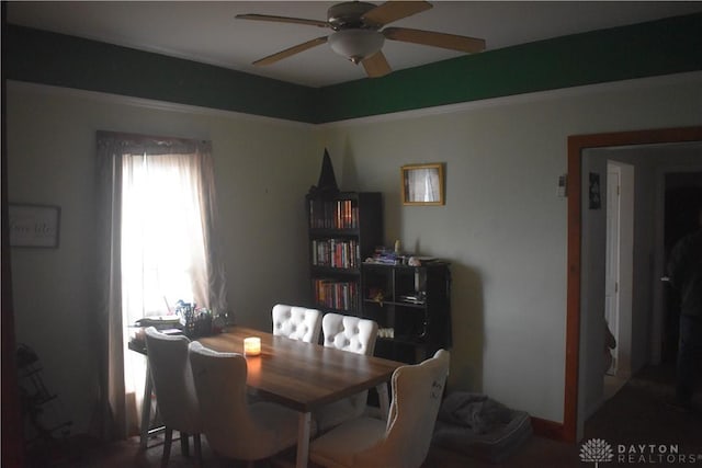 dining room featuring ceiling fan