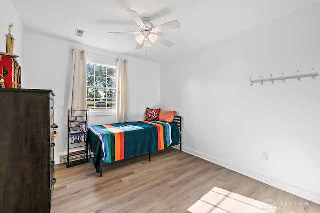 bedroom featuring ceiling fan and light wood-type flooring