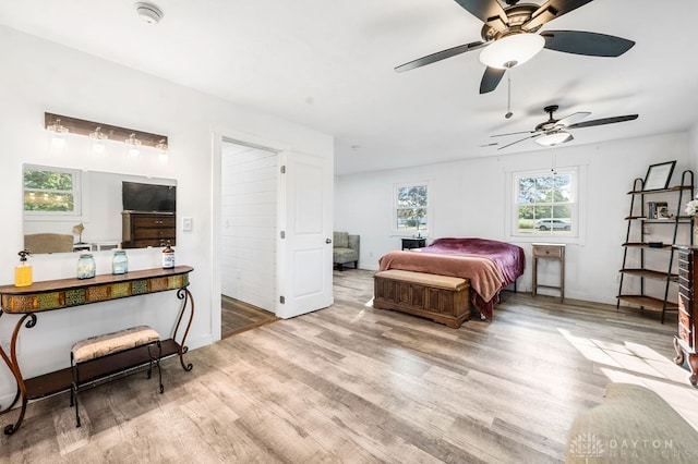 bedroom featuring ceiling fan and light wood-type flooring