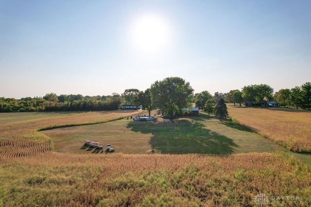 view of yard with a rural view