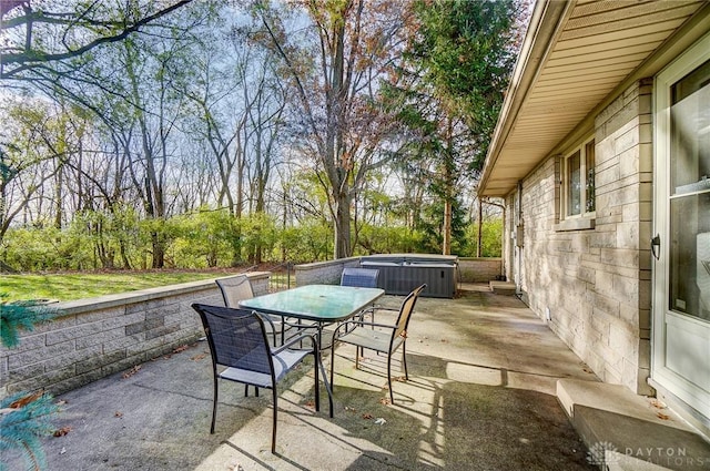 view of patio / terrace featuring a hot tub