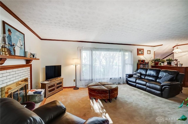 living room with a fireplace, crown molding, a textured ceiling, and light carpet