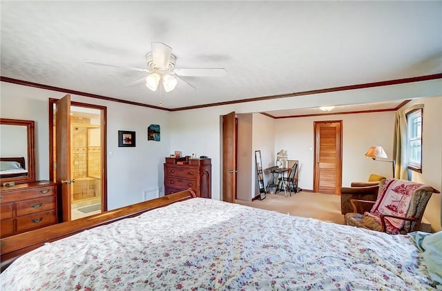 bedroom with ensuite bathroom, carpet flooring, ceiling fan, ornamental molding, and a closet