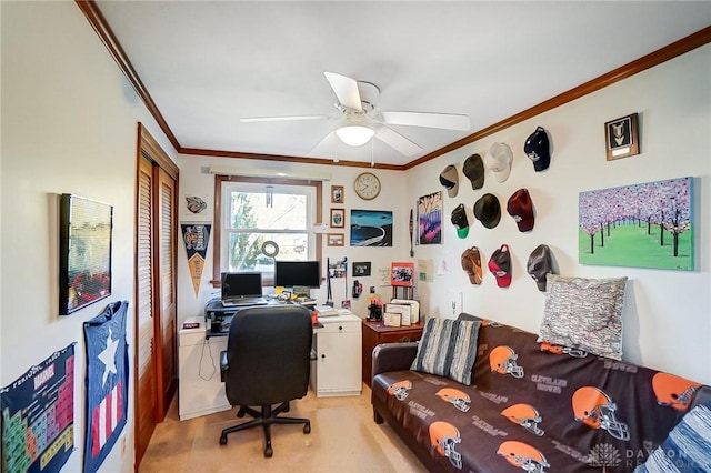 home office with ceiling fan and crown molding