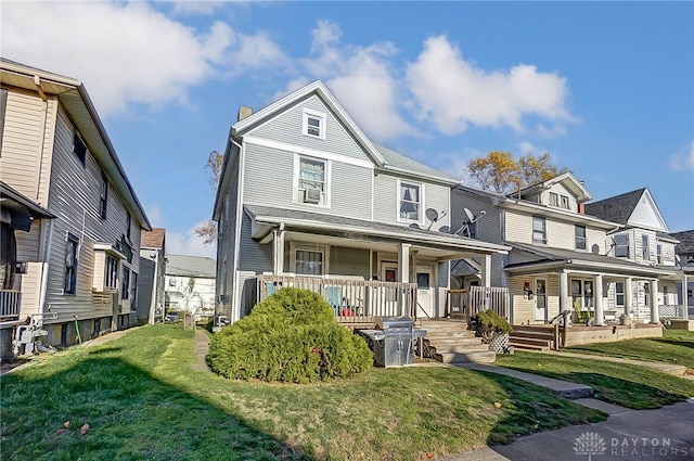 view of front of house featuring a front lawn and a porch