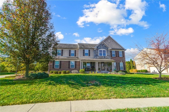 view of front of house featuring a front lawn