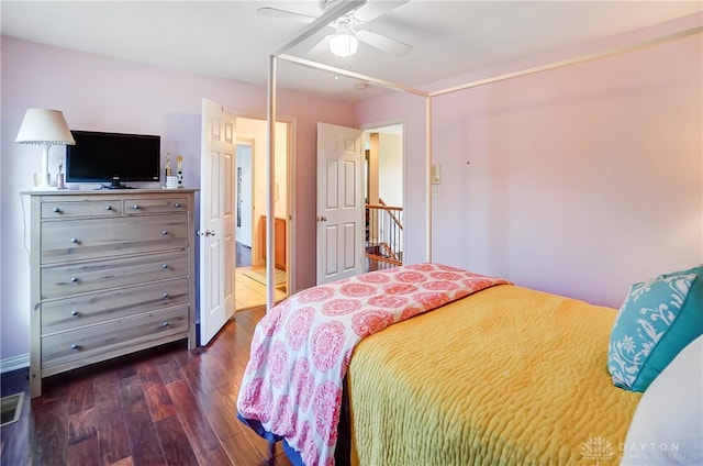 bedroom featuring ceiling fan and dark hardwood / wood-style floors