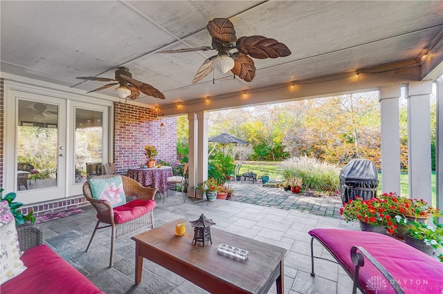 view of patio featuring outdoor lounge area, ceiling fan, and area for grilling