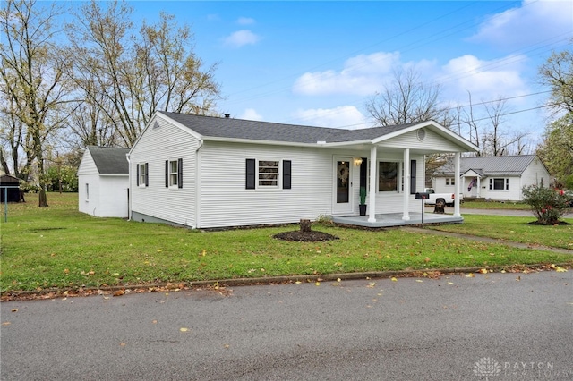 view of front of house featuring a front lawn and a porch