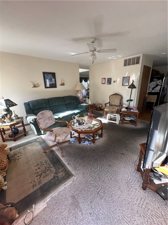 living room with carpet and ceiling fan