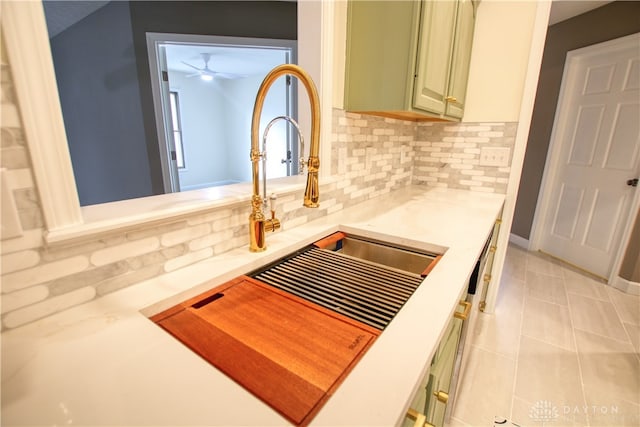 interior details with decorative backsplash and sink