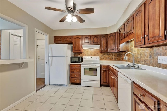 kitchen with ceiling fan, sink, white appliances, decorative backsplash, and light tile patterned floors