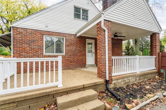 front facade with covered porch and ceiling fan