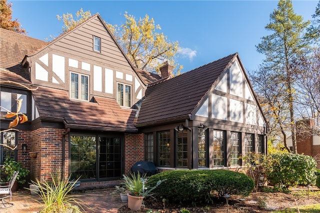 back of house featuring a patio area