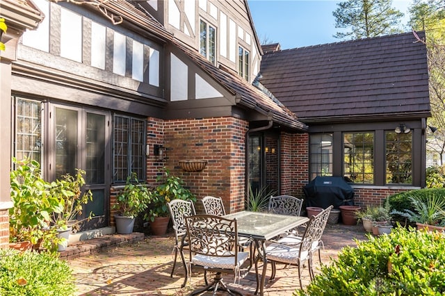 view of patio with a grill