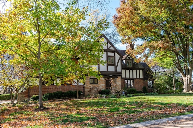 view of front of home with a front yard