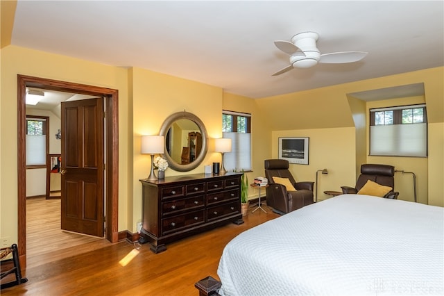 bedroom featuring wood-type flooring and ceiling fan