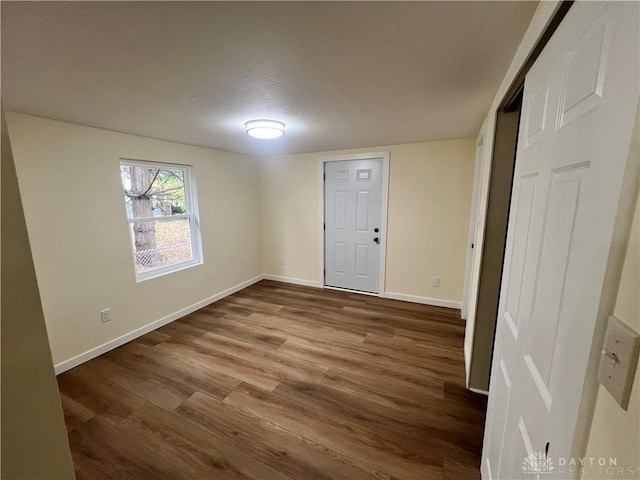 empty room featuring hardwood / wood-style floors