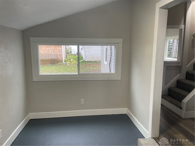 interior space with vaulted ceiling