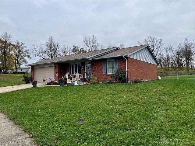 ranch-style home with a garage and a front lawn